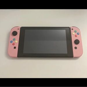 nintendo switch console + mario bros game